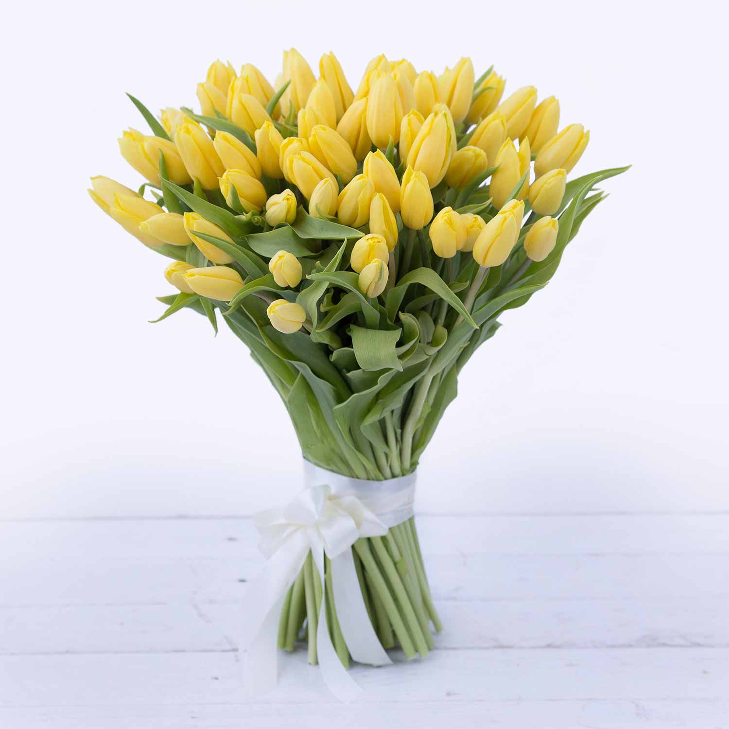 Букет из 65 желтых тюльпанов - Купить цветы